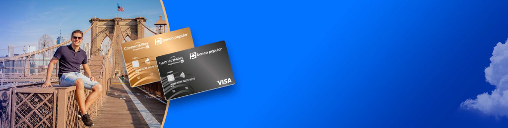 Pareja sentada en la playa con Tarjetas de Crédito Visa ConnectMiles