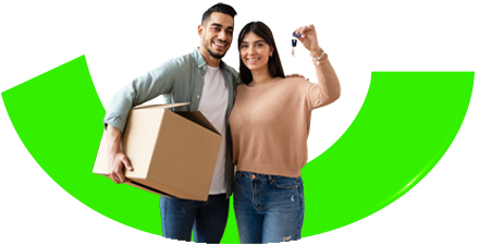 Pareja con las llaves de su nueva casa