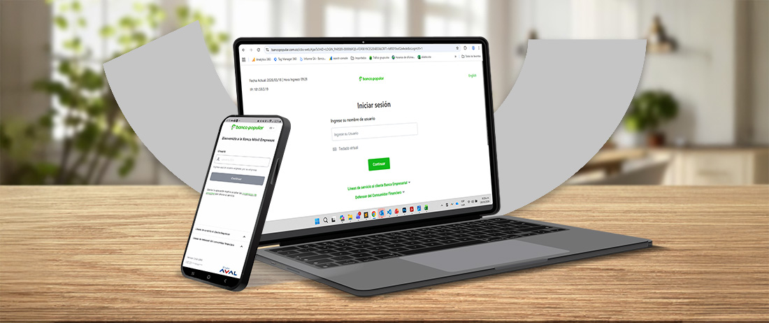Laptop y celular con la app empresarial del Banco Popular