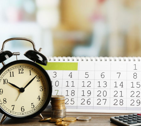 Calendario y reloj para programar ahorro